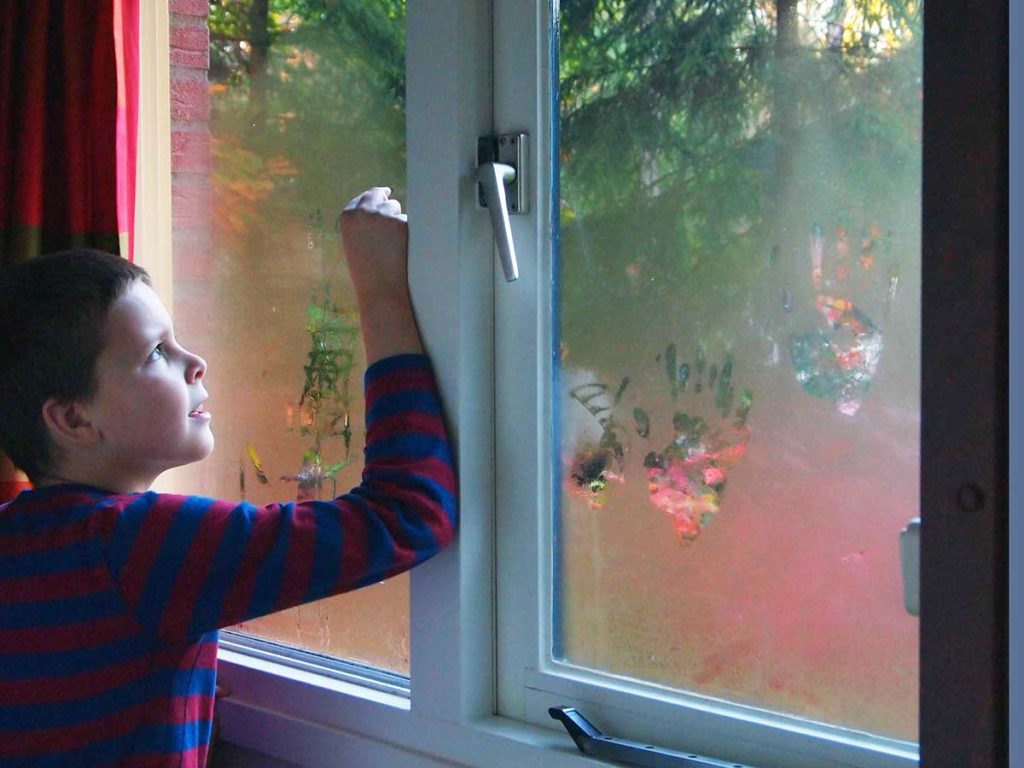 Boy at a window.